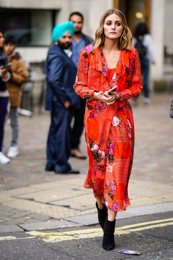 Olivia turned heads while making her way down the street in London in a Preen x L.K. Bennett dress and ankle boots.