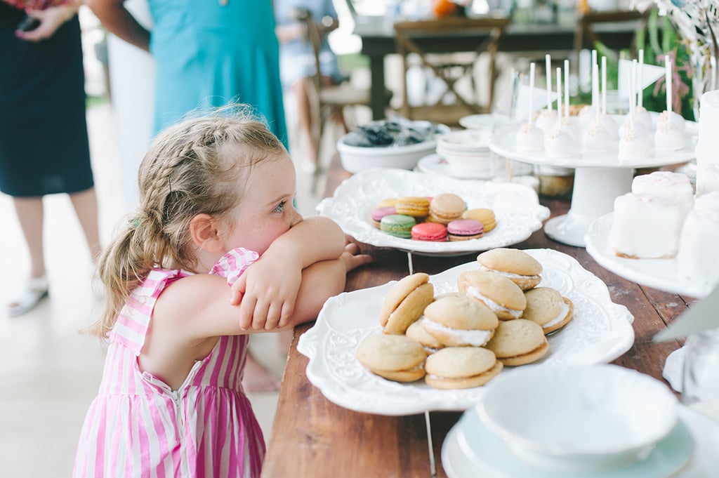 This reception is four hours long — "you can have dessert after dinner" has never required so much patience.