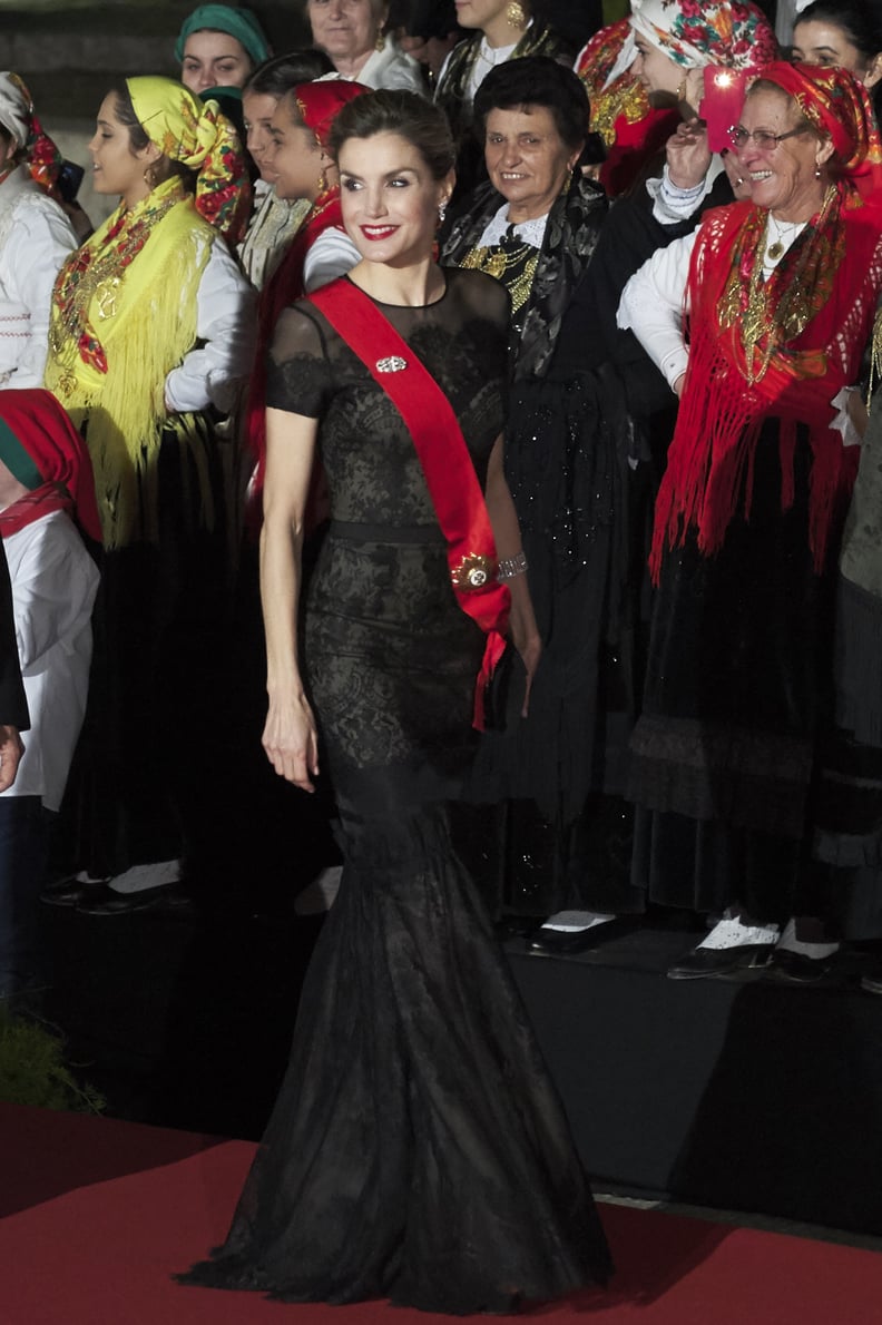 A Black Short-Sleeved Sheer Mermaid Gown From Carolina Herrera