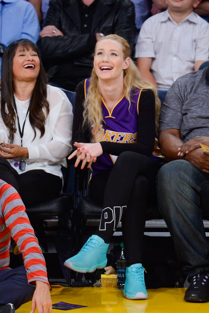 Iggy Azalea smiled widely at the LA Lakers game on Friday.