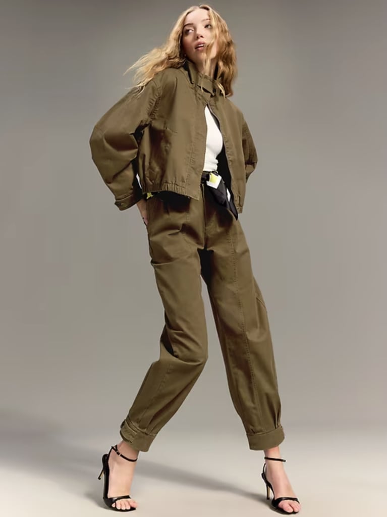 Old Navy x Christopher John Rogers Mock-Neck Bomber Jacket ($80). Old Navy x Christopher John Rogers High-Waisted Barrel Pants ($70).  
PS: Are there any styling rules that you encourage the Old Navy customer to break and play with?
CJR: I think all of them. That's what's so fun about this collection is that there's so many opportunities to discover yourself and to try new things without feeling scared. Being able to put the polka dot skirt with a striped sweater or something more directional back to jeans. It just feels easy.