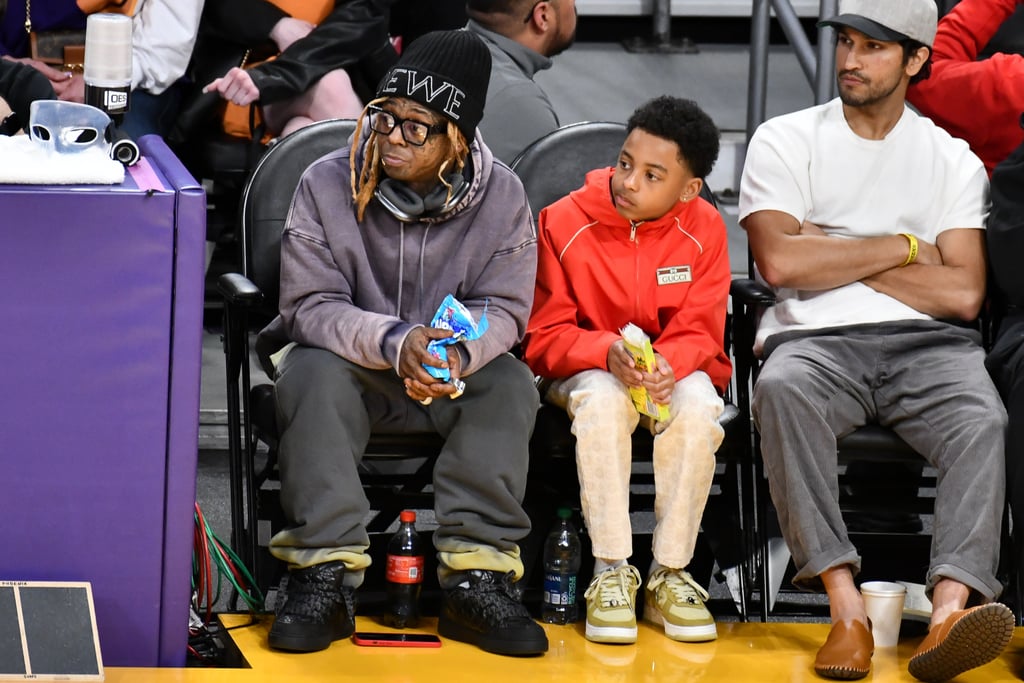 Lil Wayne and Son Kameron Carter Attend Lakers Game