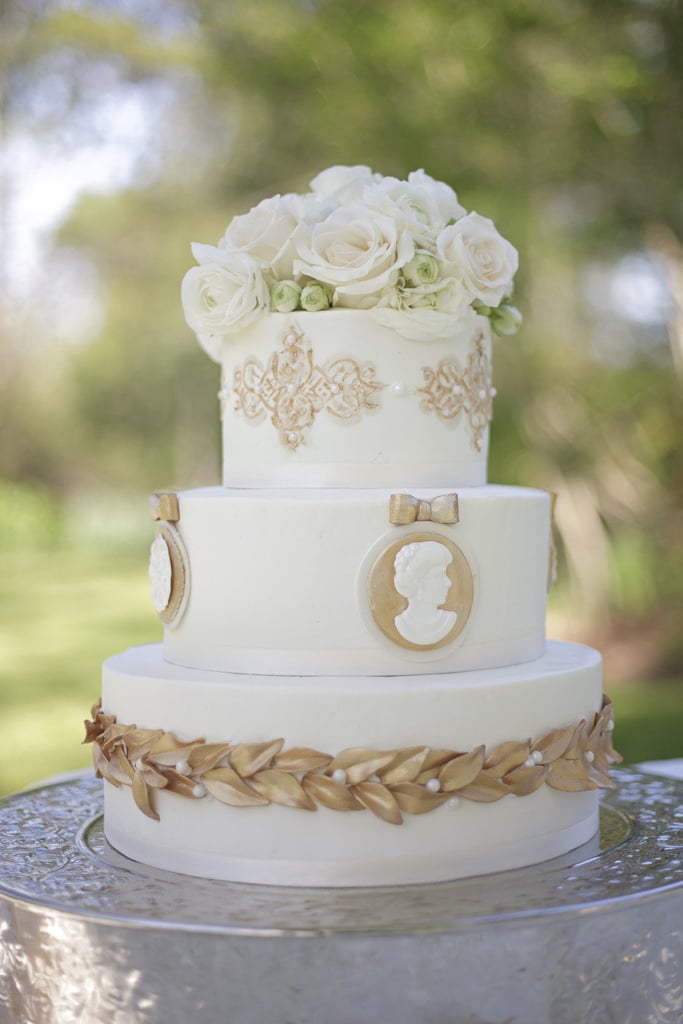 The great thing about this gold-detailed cake is that it reflects another time period but is still totally appropriate for a modern-day wedding.