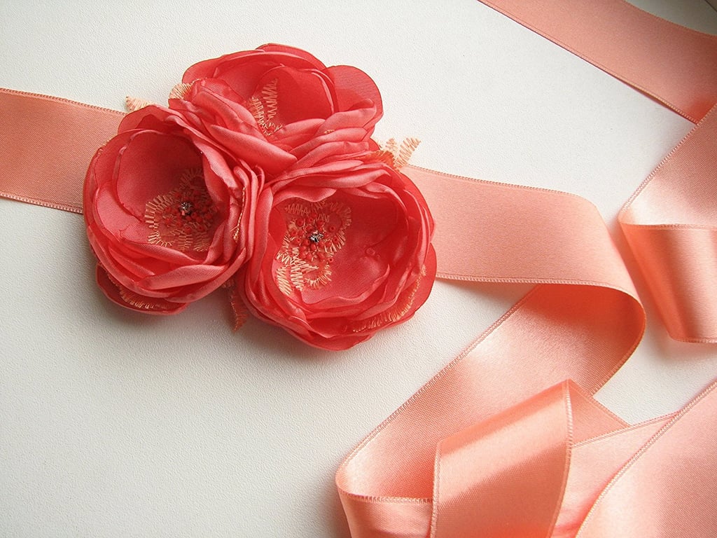 Coral pink is both elegant and romantic, so that makes this coral wedding sash ($35) the perfect addition for your bridesmaid dresses.