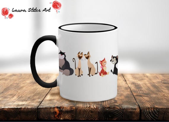 mug features illustrations of the cats of Disney