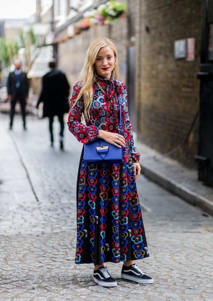 With a Long-Sleeve Floral Dress and Matching Purse