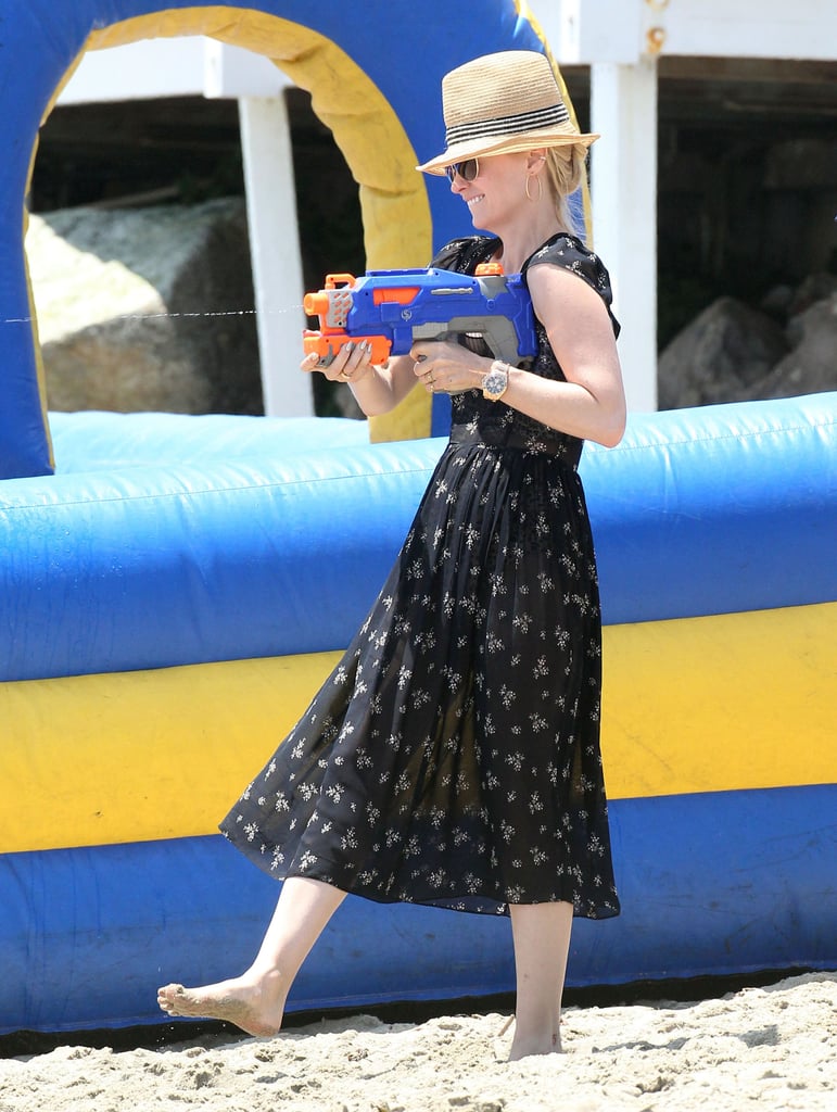 January Jones played with a squirt gun.
