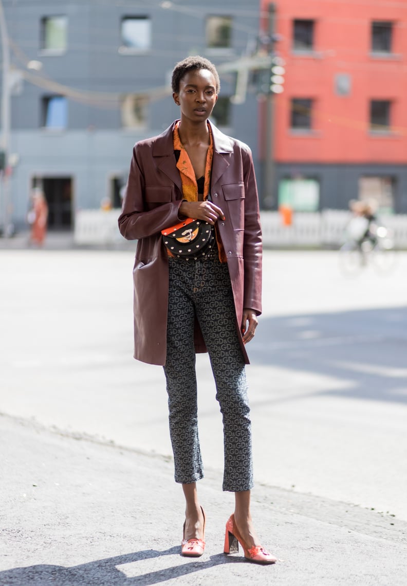 Layer Your Go-To Neutral Coat Over Your Look to Mute It a Bit
