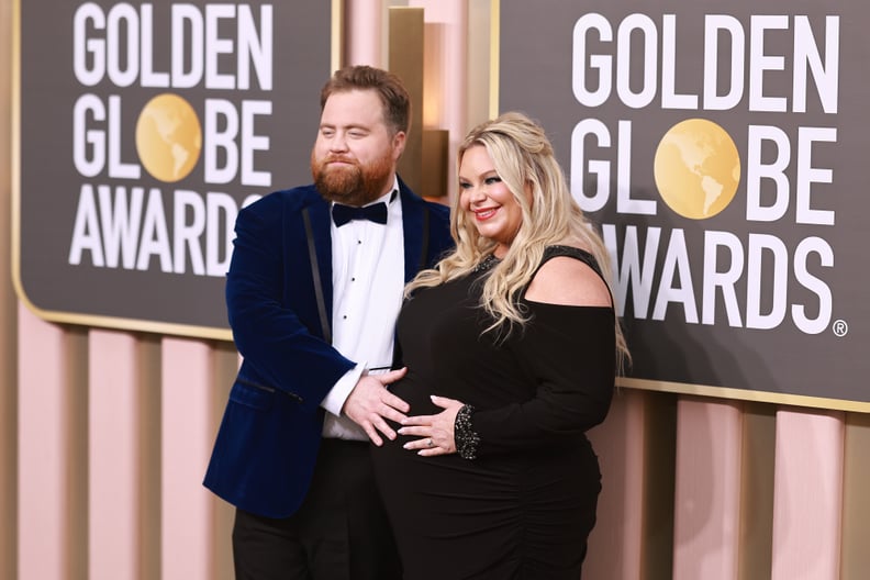 Paul Walter Hauser and Amy Elizabeth Boland at the 2023 Golden Globes