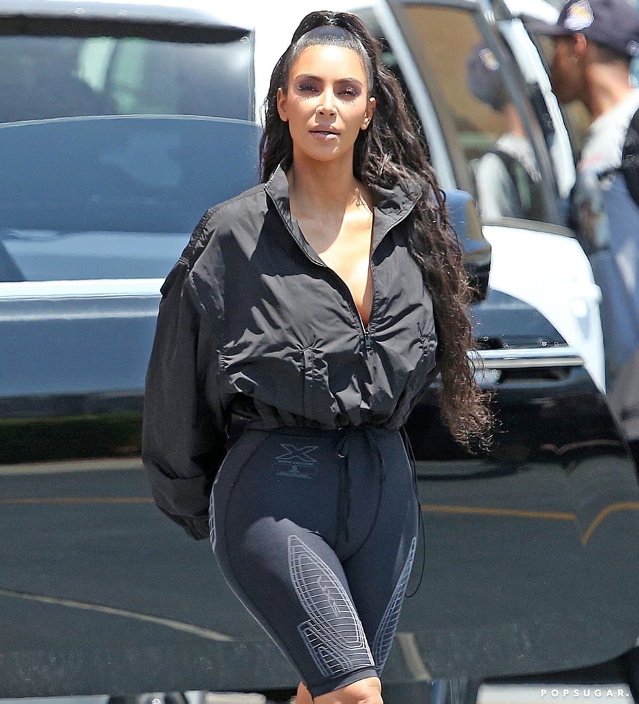 Kim Kardashian Wearing Yeezy Slides and Socks