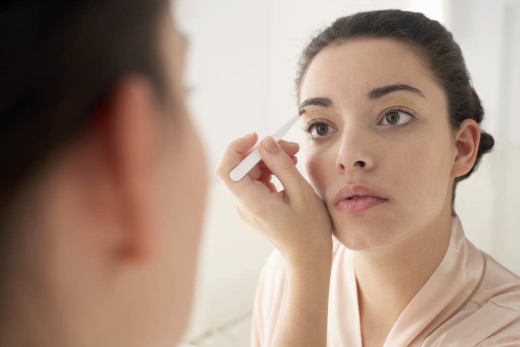 In Between Salon Visits, Only Use Tweezers