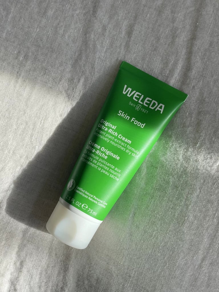 Weleda Skin Food Original Ultra-Rich Cream ($16, originally $20)
Weleda's Skin Food Original Ultra-Rich Cream has not only gone viral on TikTok but also has a cult following among editors and makeup artists alike. It's formulated with pansy oil — which helps moisturize and support the skin — along with beeswax and sunflower oils that strengthen the skin's barrier. With a rich, thick texture, this is perfect for anyone who needs a boost of hydration in their routine, and one our editor loves using. Read more about her experience in our Weleda Skin Food Original Ultra-Rich Cream review. 
Editor Quote: "No matter how dry your skin may be, this thick cream will restore it back to a hydrated state while giving you a glossy glow-from-within look that can even double as a highlighter. . . . Pro tip: mix it into foundation or apply it with oil for a glowy complexion."– Haley Lyndes, shopping staff writer