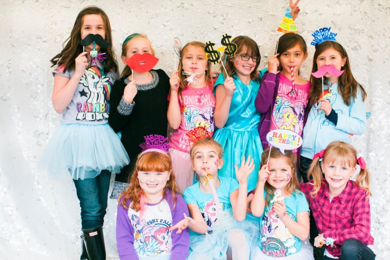 As always, my friend Kelly of KCB Photography captured all the details and rainbow magic from Ally’s Pony Party. The girls had a blast taking photos together with inexpensive photo props I picked up at Walmart!