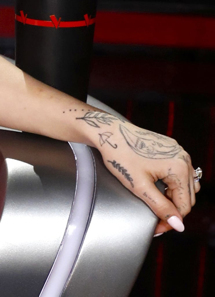 Ariana Grande's Umbrella Hand Tattoo