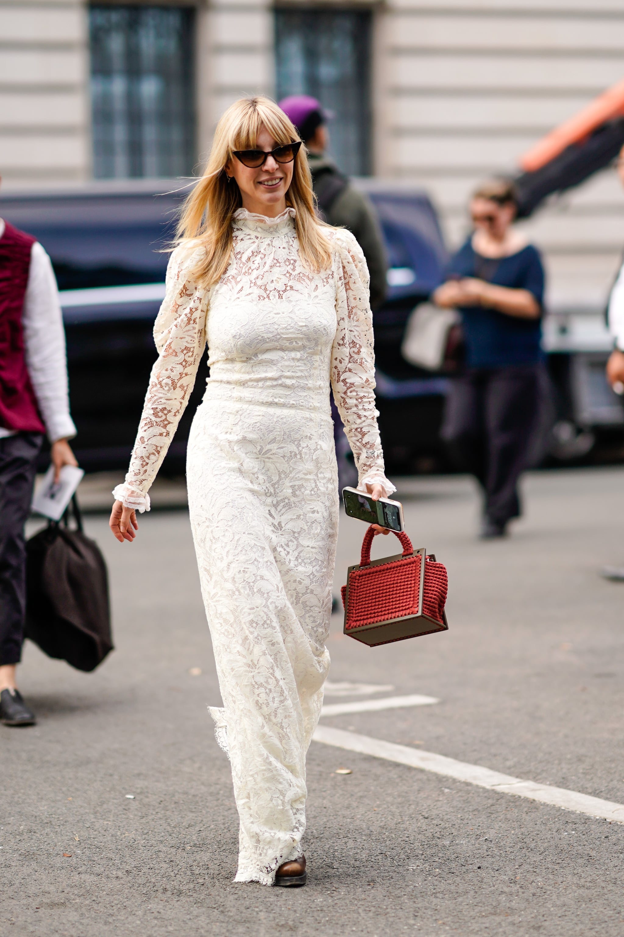 Wear a lace dress with a top-handle bag., This Is How You Should Be Styling  Your Maxi Dress This Season, According to Street Style Stars