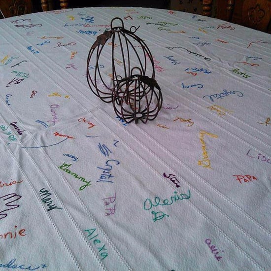 Family's Color-Coded Signed Thanksgiving Tablecloth