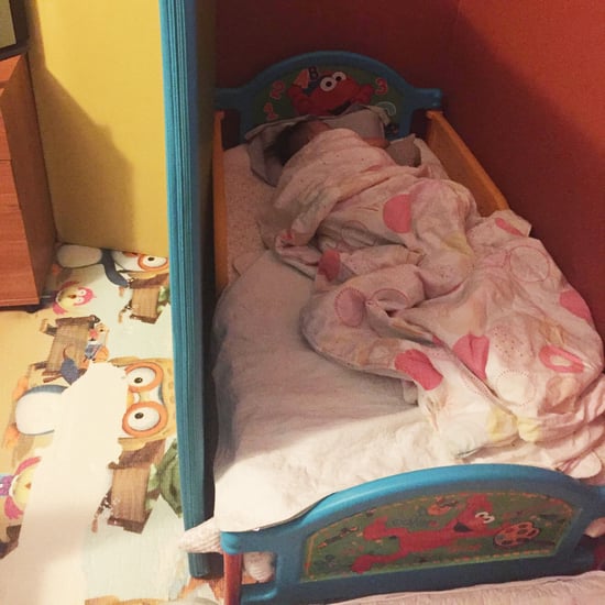 Photo of Boy Sleeping in Makeshift Room