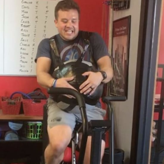 Dad Wears Medicine Ball During CrossFit Workout