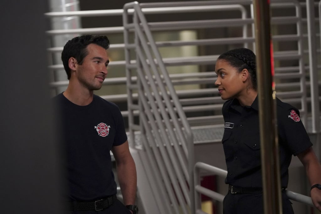 Jay Hayden and Barrett Doss in character as firefighters Travis Montgomery and Victoria Hughes.