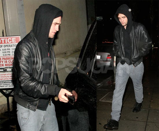 Robert Pattinson Gets Caught in the Rain
