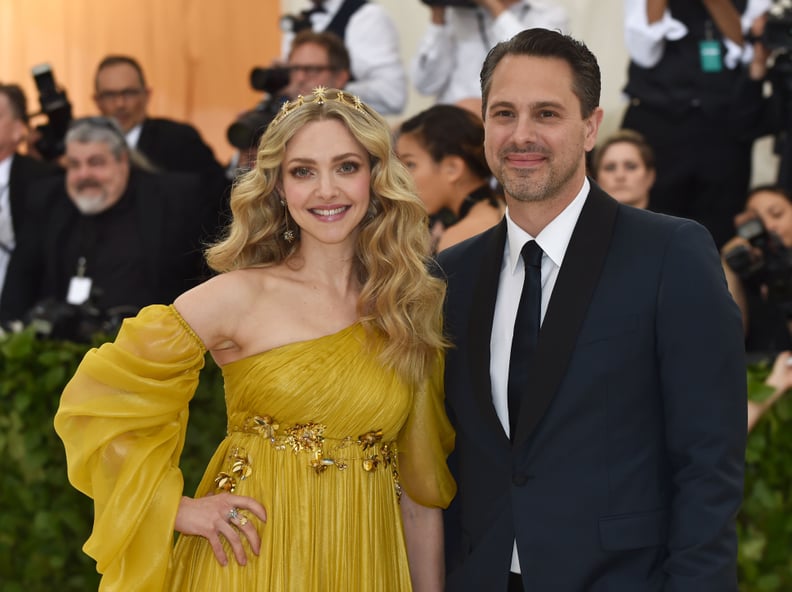 Amanda Seyfried and Thomas Sadoski arrive for the 2018 Met Gala on May 7, 2018, at the Metropolitan Museum of Art in New York. - The Gala raises money for the Metropolitan Museum of Arts Costume Institute. The Gala's 2018 theme is Heavenly Bodies: Fashion