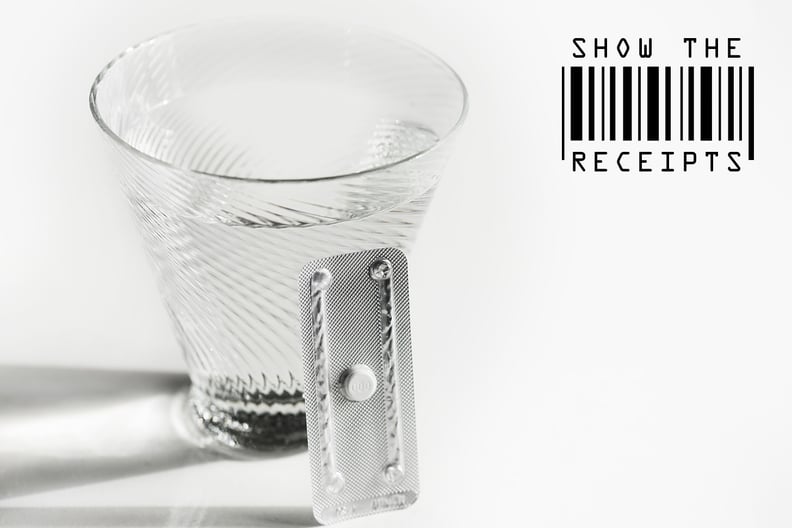 abortion pill and cup of water