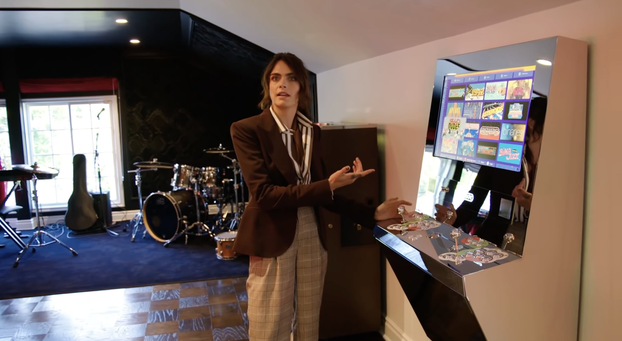 Cara showed off another arcade machine. | A Ball Pit, Costume Room, and  Vagina Tunnel: Inside Cara Delevingne's "Mad Hatter" Home | POPSUGAR Home  Photo 50