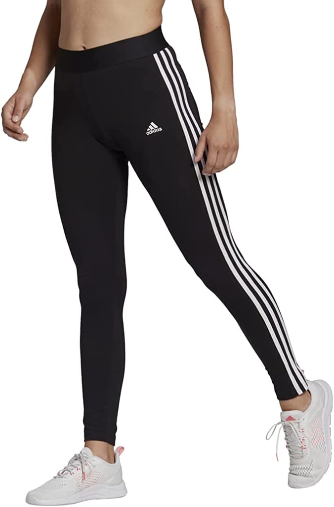 Adidas Plus-Size Essentials 3-Stripes Leggings ($18, originally $40)
Like us, if you've been pining for a pair of striped Adidas leggings, now's your chance to shop the athletic bottoms on sale. Unlike other compressive leggings, this pant is made from a stretchy material that's designed to move with your body, rather than constrict it during a workout.