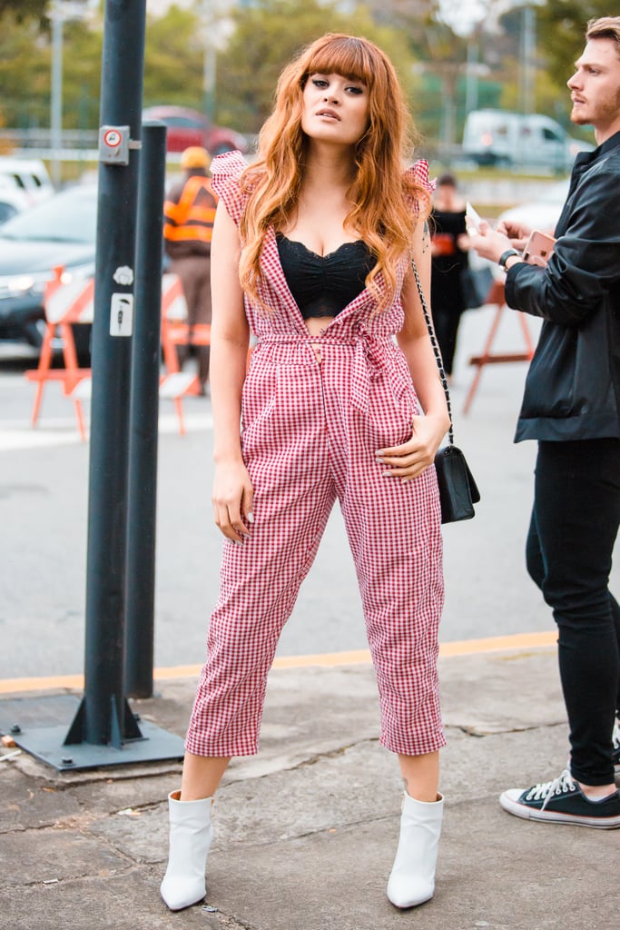 Show off your crop top in a striped jumpsuit undone.
