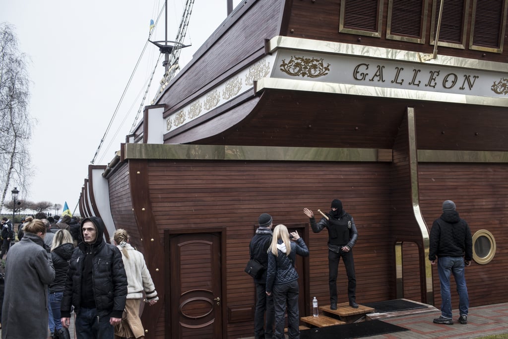 A replica galleon sat on a waterway at the compound.