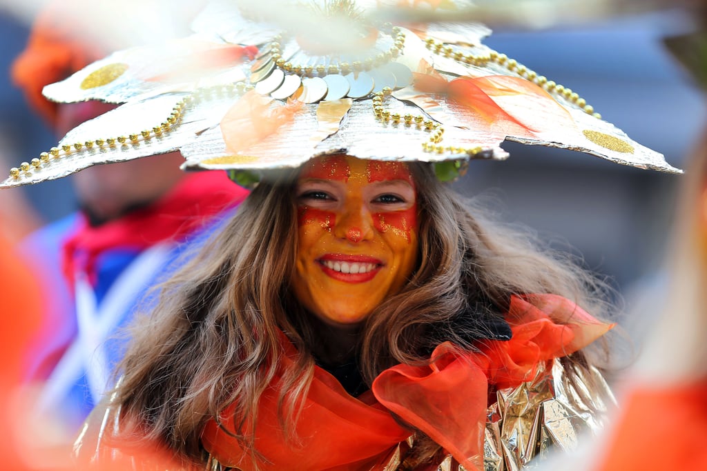 A Karneval-goer smiled in Cologne, Germany, where revelers wore homemade costumes.