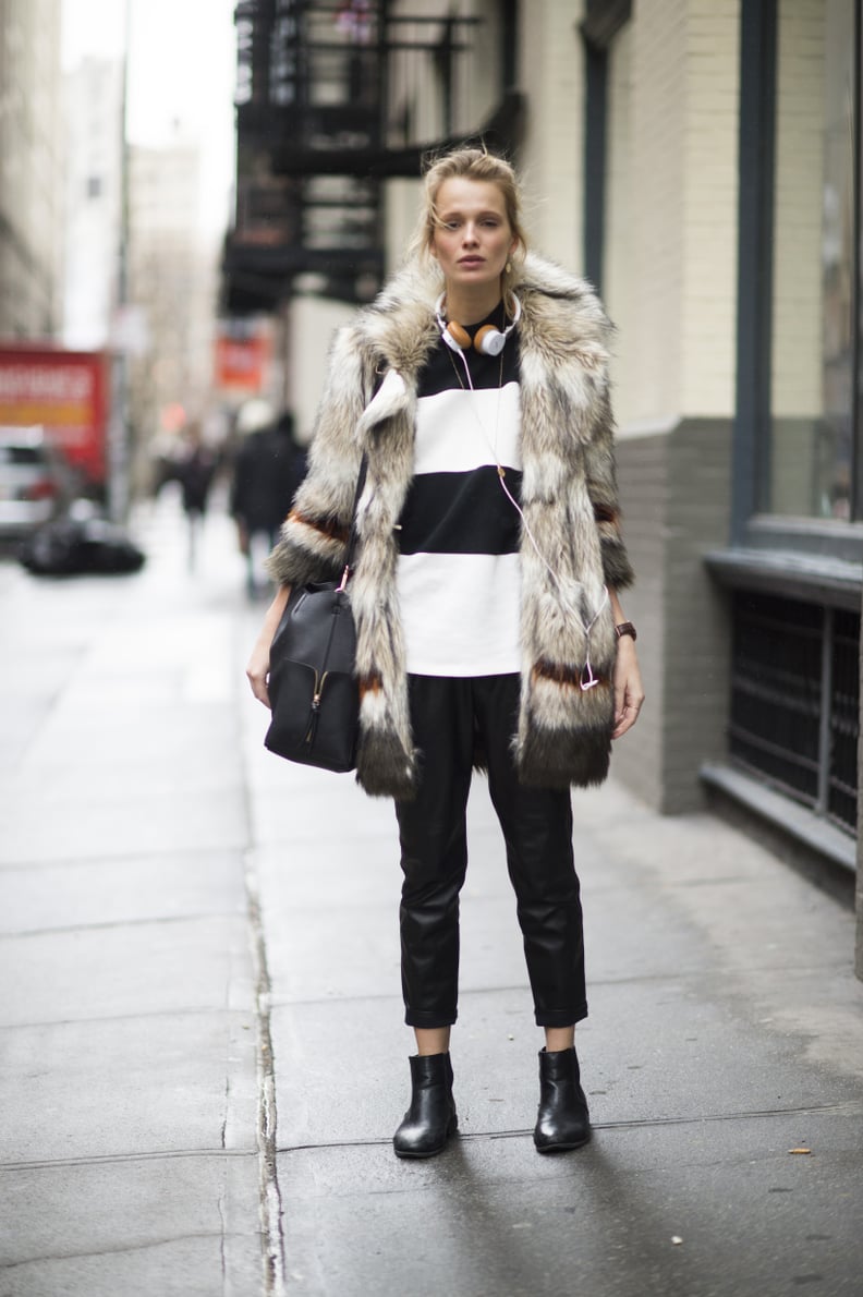 With a Furry Coat, Striped Sweater, and Black Booties