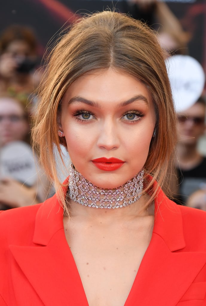 Bold: Gigi Hadid
A matching orange-red lip conveys instant glamour.