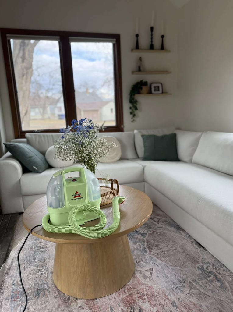 Bissell Little Green Mini Portable Carpet Cleaner ($75, originally $124)
The thousands of five-star ratings for this cleaning device don't lie — it's genuinely worth the hype. You can use it on pretty much anything: pet stains, red wine spills, stairs, car seats, you name it. Get more details in our Bissell Little Green Mini Portable Carpet Cleaner review. 
Editor Quote: "What I like about the Bissell Little Green Mini Portable Carpet Cleaner is that, true to its name, it's compact, easy to stash out of sight when not in use, and surprisingly powerful. It cleans stains and messes thoroughly (more on that in a minute), is super simple to operate, and works on most soft surfaces— aside from super delicate fabrics and high-pile carpets." — Marisa Petrarca, contributing shopping editor
