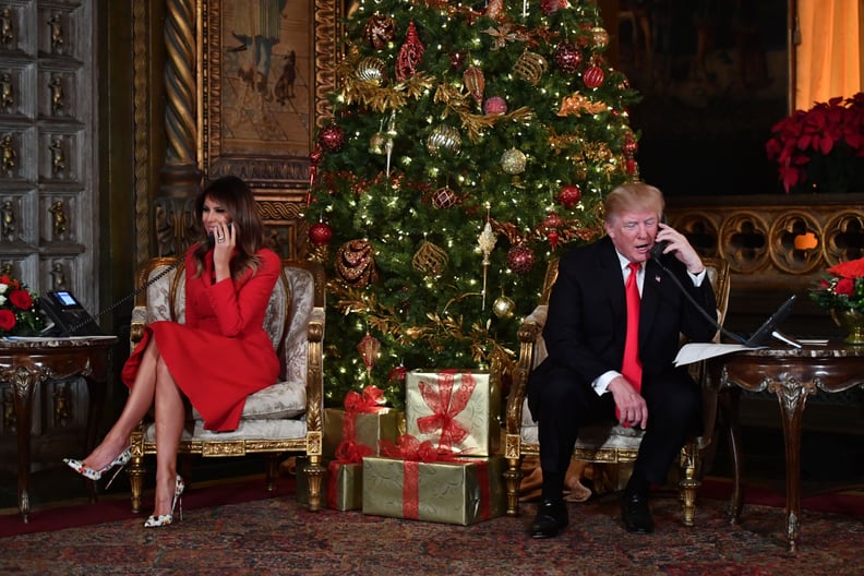 Melania Wore a Red Dior Suit and Christian Louboutin Pumps to Field Santa Tracker Calls