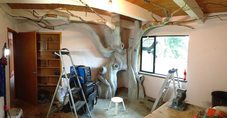 He then applied concrete for the trunk and paper mache for the branches.