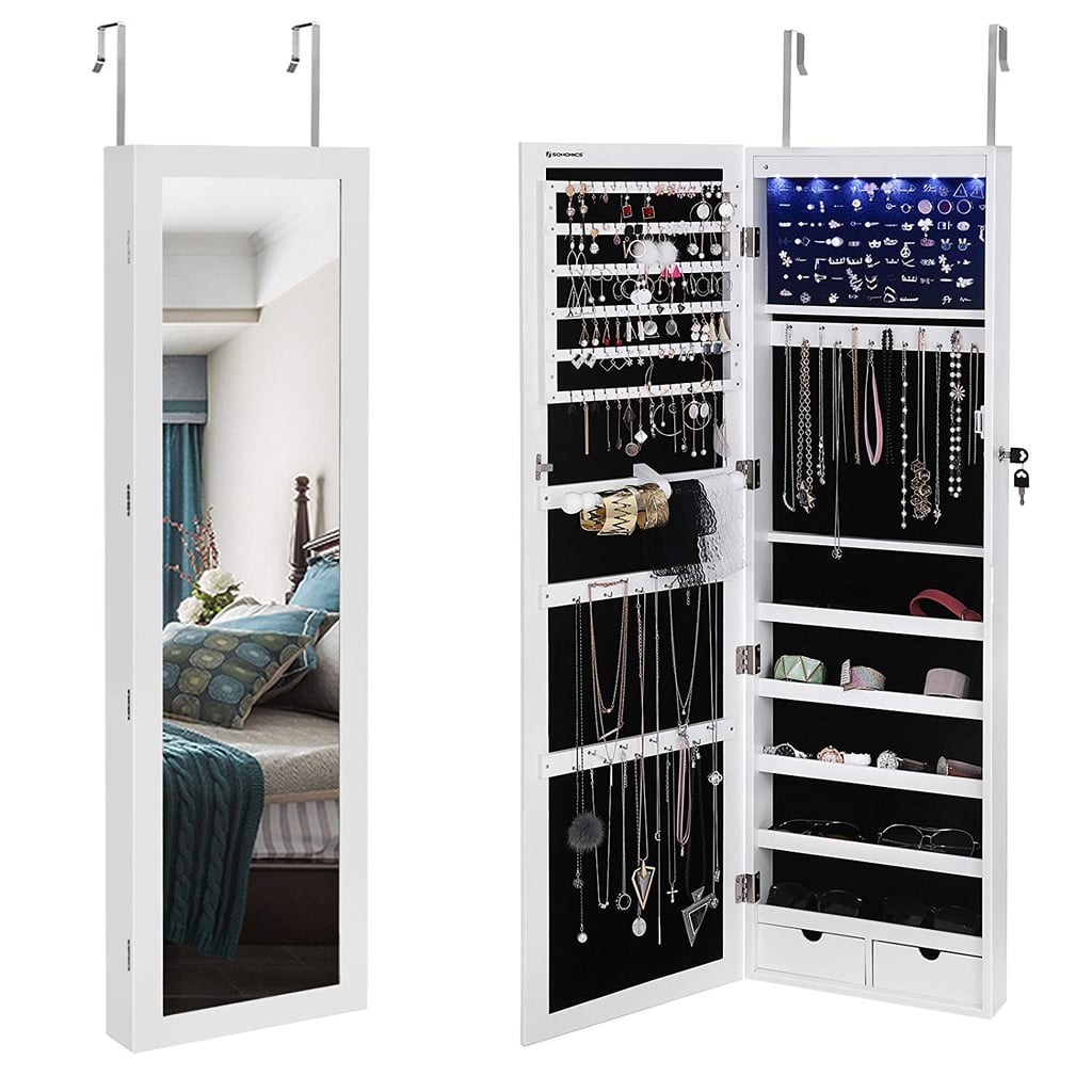Functionality meets ultimate jewellery storage with the SONGMICS Jewellery Wall/Door Mounted Jewellery Organiser with Mirror ($130). Not only is it an over-the-door (or mounted — your choice) mirror, but it opens to feature double-sided jewellery storage with built-in LED lights. Fancy!
