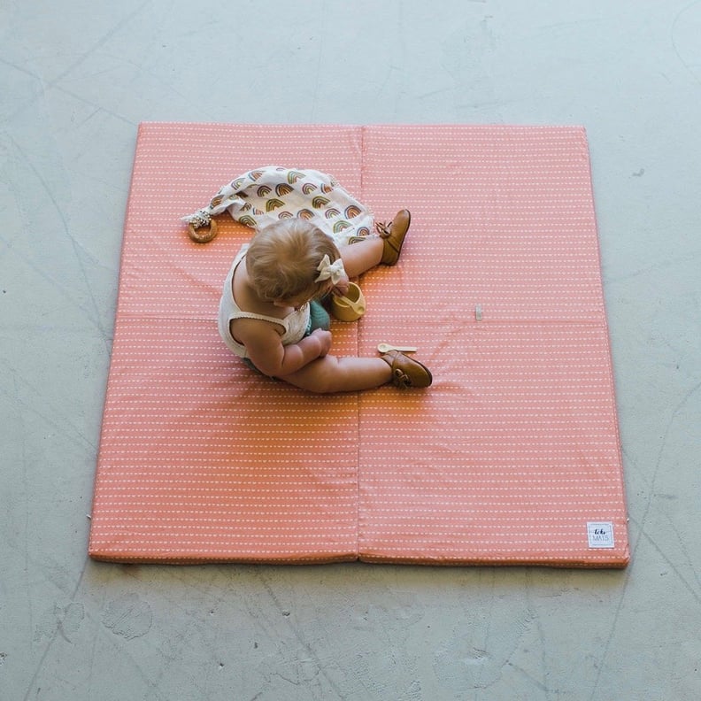 Coral crescent padded play mat
