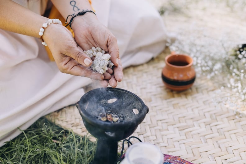 Mexico, Queretaro State, Queretaro City - January 25, 2022: Group of latina women performing a cacao ceremony outdoors.