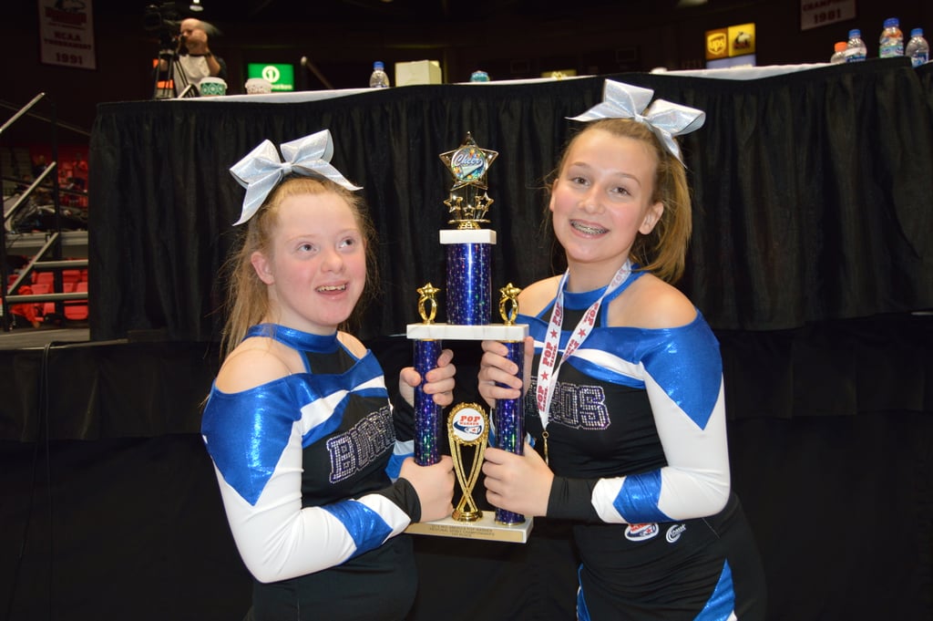 Audrey's biggest accomplishment to date? Winning the 2019 Pop Warner National Cheer & Dance Championships in Orlando, FL with her team on Dec. 6. 
"The nicest compliment is when people ask where Audrey is in the routine," explained Jody. "Unless someone tells you there is a child with Down syndrome on the floor you wouldn't know it."
And obviously, Audrey's teammates are just as fond of her as she is of them. 
"Not only did Audrey and her squad win Nationals but these amazing girls unanimously voted her their Homecoming Queen this past October," said Jody.  "It has been a dream come true experience."