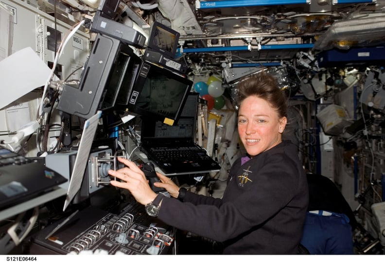 IN SPACE - JULY 13:  Mission specialist Lisa M. Nowak works at the Mobile Service System (MSS) and Canadarm2 controls in the Destiny laboratory of the International Space Station July 13, 2006. Nowak is a crew member aboard the Space Shuttle Discovery, wh