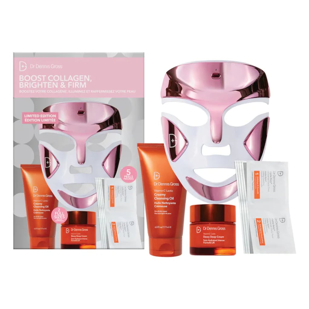 Dr. Dennis Gross Skincare Boost Collagen, Brighten and Firm Skincare Gift Set ($455)
This gift set may be a splurge, but wow, is it the kind of present beauty dreams are made of. It includes a limited-edition pink version of the brand's bestselling LED mask (the one celebs and our senior beauty editor use as religiously as their morning coffee), along with a full-size vitamin C cleansing oil, moisturizer, and a pack of Daily Peel Pads. For context: the LED mask on its own normally costs the same price as this entire set. Learn more about the LED mask in our Dr. Dennis Gross Skincare DRx SpectraLite FaceWare Pro review.
Editor Quote: "There are a number of things that I love about the Dr. Dennis Gross Skincare DRx SpectraLight FaceWave Pro. First is the fit. Most LED masks that I've tried slip and slide around on my face, making them only usable when laying down and holding them in place. I can put this one on and go about my day, from watching TV to folding laundry. I also love how easy it is to use. There aren't any overcomplicated settings — you simply press a button and it begins to work its magic. Though LED light therapy takes a little while to see the benefits — Dr. Dennis Gross Skincare recommends you use it for 10 weeks to see results — I feel the blue-light treatment immediately reduces any redness I'm experiencing."  — Jessica Harrington, beauty lead