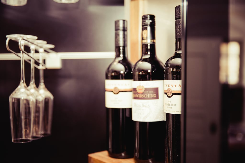 Sharing a bottle of red wine with friends.