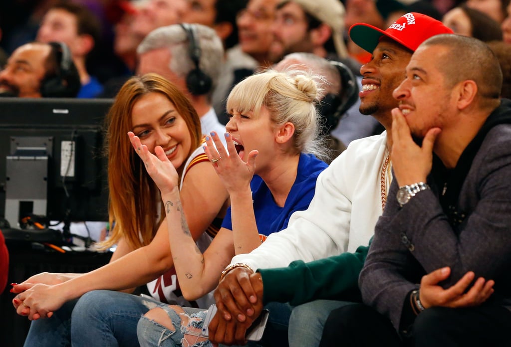 Miley Cyrus and her sister Brandi had pained expressions while watching the Knicks play the Cleveland Cavaliers in March 2016.