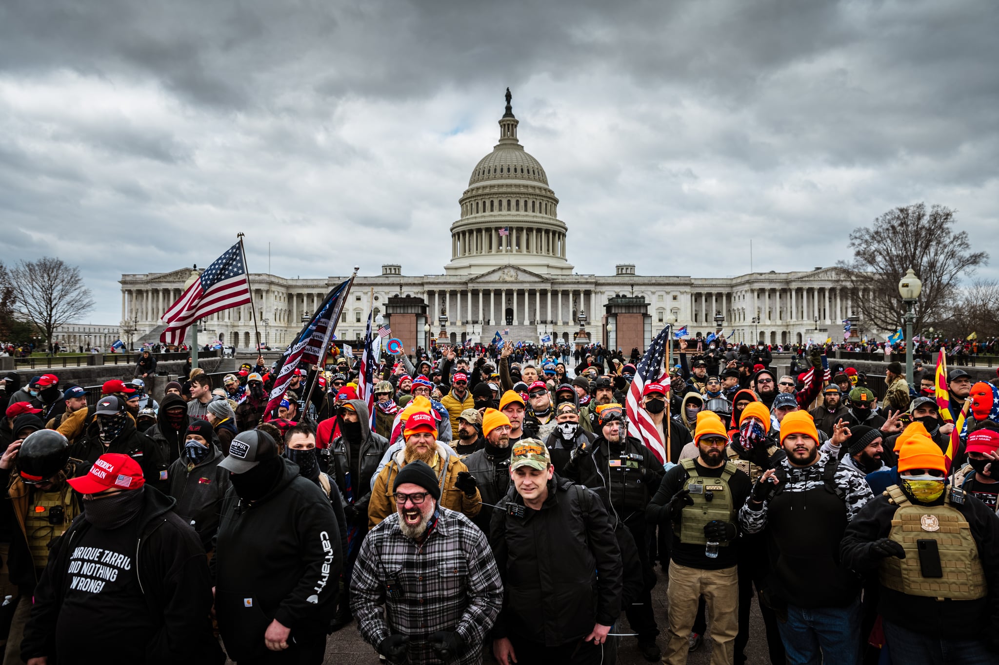 WASHINGTON, DC - JANUARY 06: Pro-Trump protesters gather in front of the U.S. Capitol Building on January 6, 2021 in Washington, DC. A pro-Trump mob stormed the Capitol, breaking windows and clashing with police officers. Trump supporters gathered in the nation's capital today to protest the ratification of President-elect Joe Biden's Electoral College victory over President Trump in the 2020 election. (Photo by Jon Cherry/Getty Images)