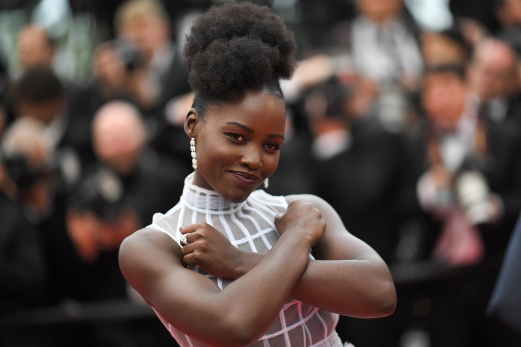 Lupita Nyong'o is turning heads at the Cannes Film Festival. On Thursday, the Black Panther star arrived in style by boat with her 355 costars Marion Cotillard, Jessica Chastain, Penélope Cruz, and Fan Bingbing for a photocall promoting their upcoming all-female spy thriller (which, by the way, we are totally f*cking pumped for). Lupita looked like an Old Hollywood bombshell in a fitted black halter dress and cat-eye shades. Later that evening, she turned it out on the red carpet for the premiere of Sorry Angel (Plaire, Aimer Et Courir Vite); Lupita was a total vision in white Dior Haute Couture and even struck a Wakanda salute pose for photographers.

    Related:

            
            
                                    
                            

            32 Times Lupita Nyong&apos;o Was a Perfect Human Being
        
    
Lupita may not have been in attendance at the Met Gala in NYC on Monday, but the rest of her Black Panther costars — including Michael B. Jordan, Chadwick Boseman, and Letitia Wright — partied it up in her honor. It was also announced this week that Lupita will be starring alongside her Black Panther costar Winston Duke, as well as Elisabeth Moss, in Jordan Peele's Us. It will be the director's first big-screen project since Get Out (and yes, we are totally f*cking pumped for that, too). Keep reading to see Lupita taking Cannes by storm.