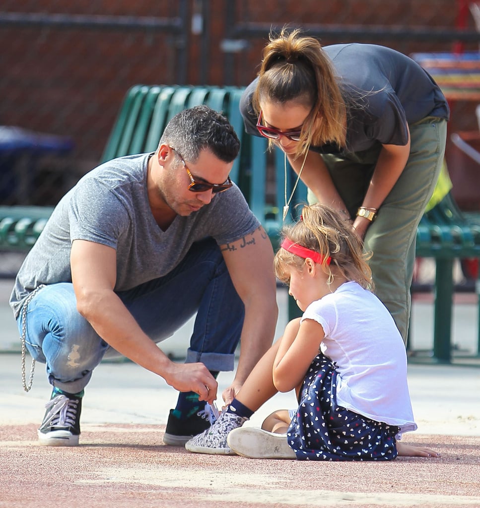 Jessica Alba watched as her husband, Cash Warren, tied little Honor's shoelace.