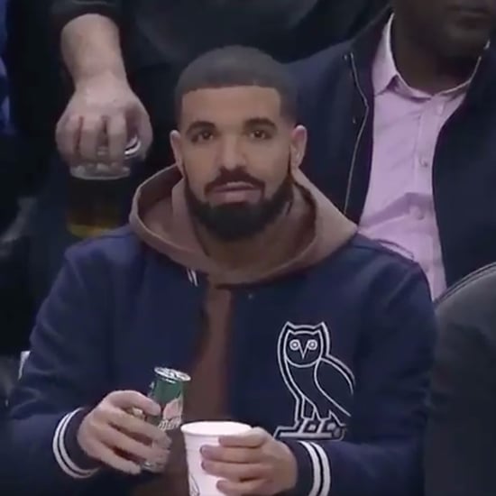 Drake Mixing His Own Drink at Basketball Game