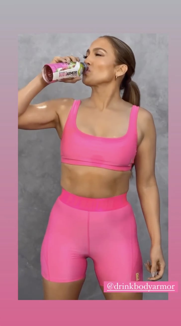 J Lo Wears a Hot Pink P.E Nation Sports Bra and Biker Shorts