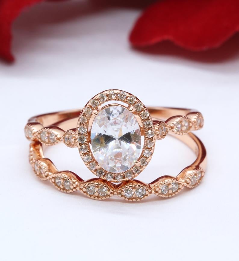 Halo Two-Piece 1.21 Carat Oval Simulated Diamond in Rose Gold
